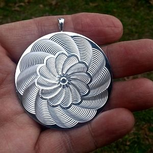 Spiral shell w/ reversed flower